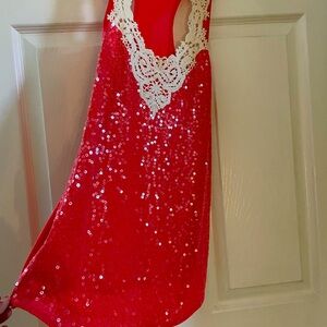 Bright pink long halter top with lace trim on top and sequin all front.